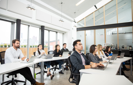 Students learning to code in a classroom at BrainStation New York.